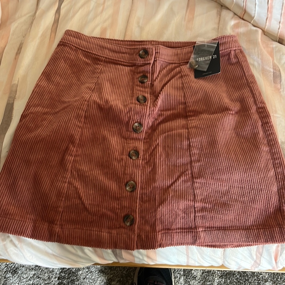 Womens mid calf corduroy skirt brand new with tags.